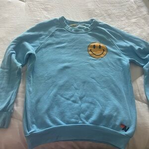 Blue Smiley Face Sweater